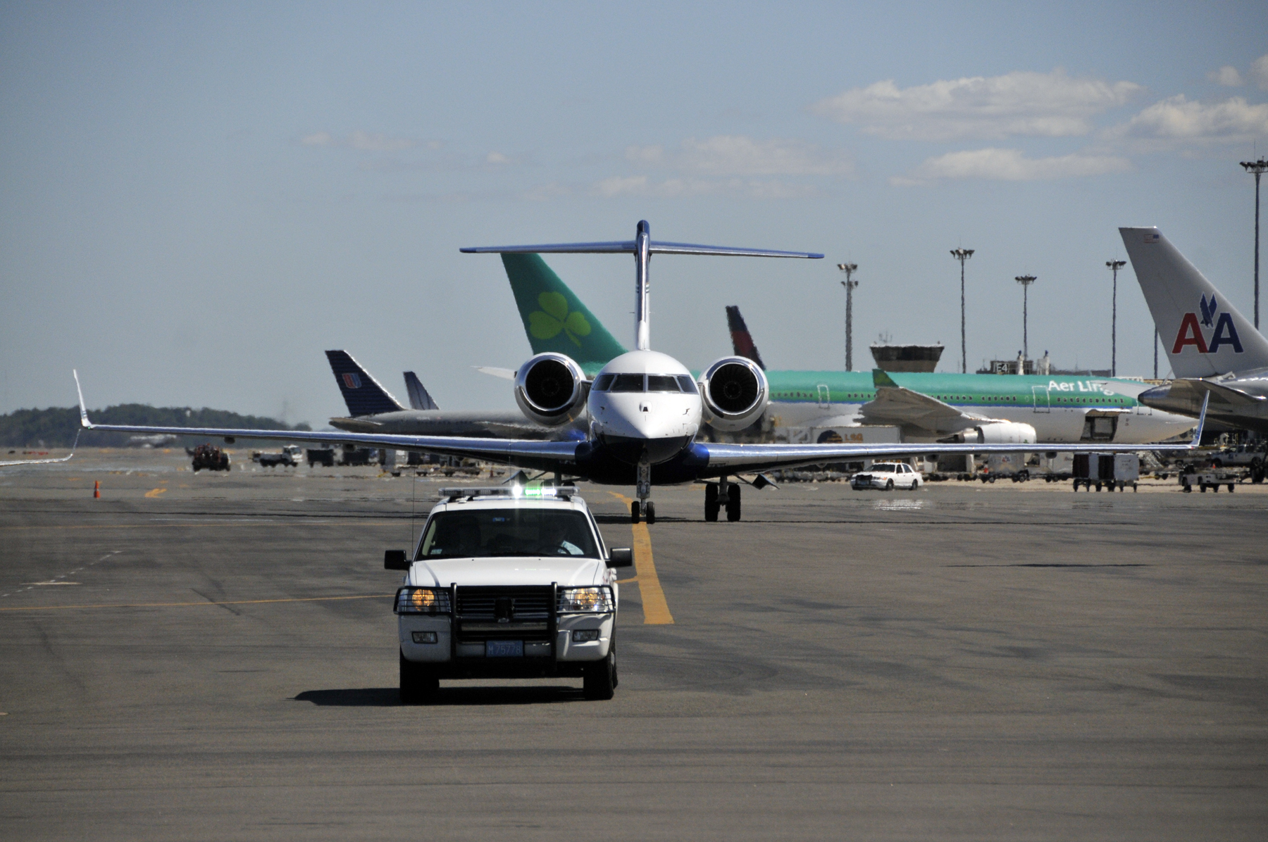 Plane carrying Jimmy Carter and Aijalon Gomes arrives in Boston from North Korea.