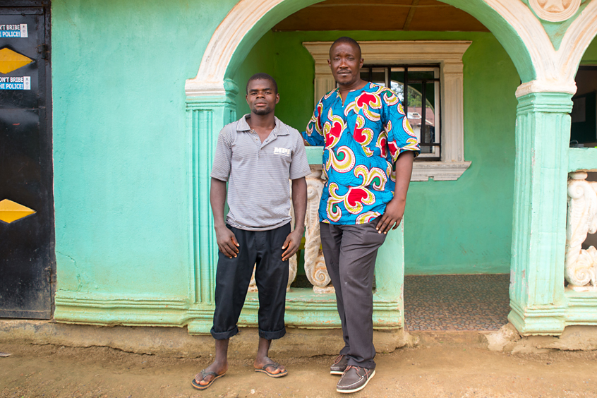 Luckily for him, Victor Tuazama (right) happened by and explained to the policeman that debts are civil matters, not criminal ones.