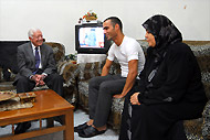 President Carter visits the Sa'id family. 